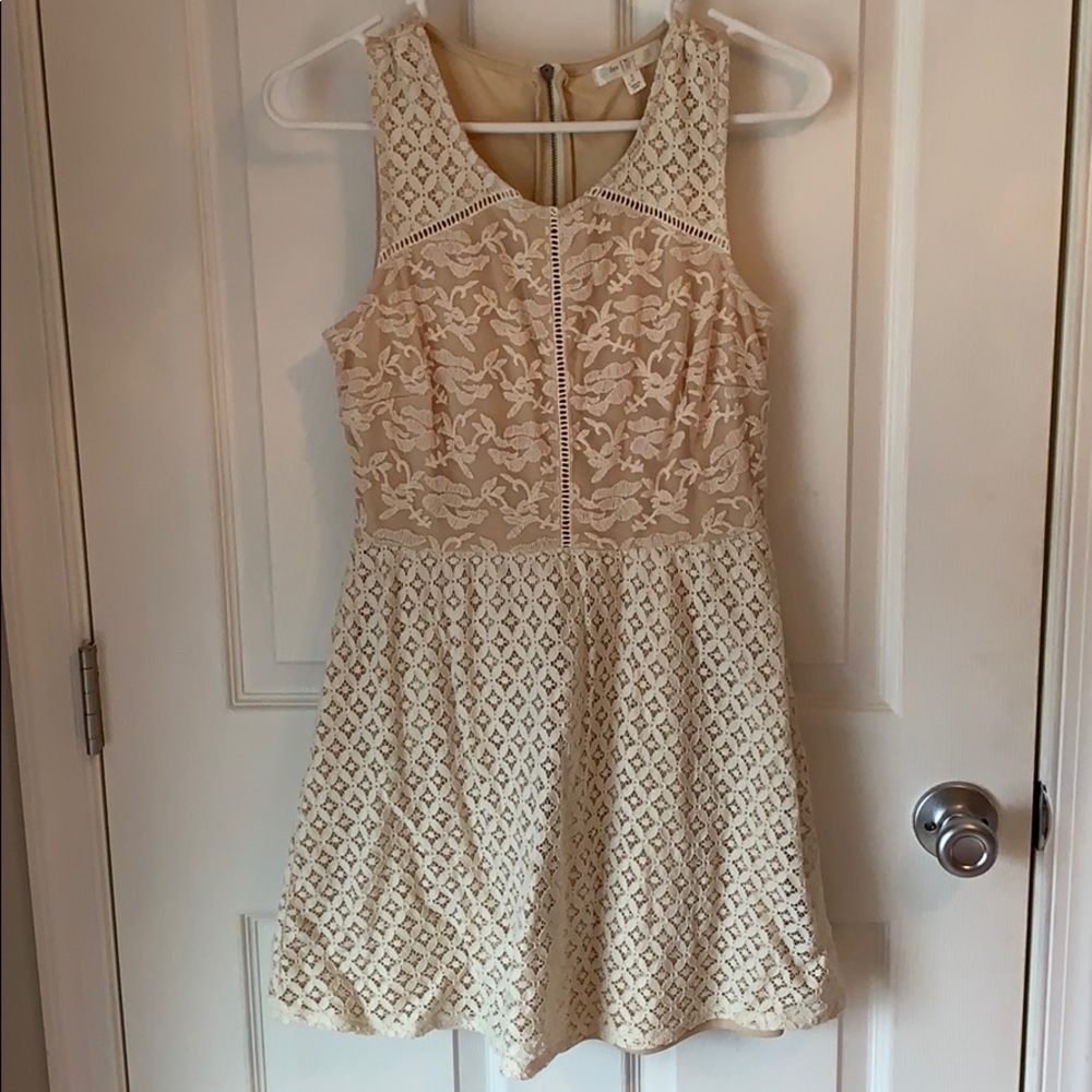 Cream dress with crocheted details
